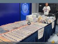 香港警方展示JPEX案件行动所得证物，包含大量现钞、名贵手袋等